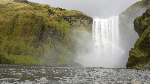 Beautiful waterfall with a rainbow Stock Footage 74906701