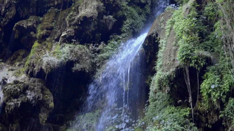 Beautiful waterfall stream like a shower Stock Footage 58499720