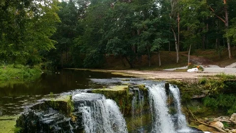 Beautiful waterfall in a summer forest. Stock Footage 94431534