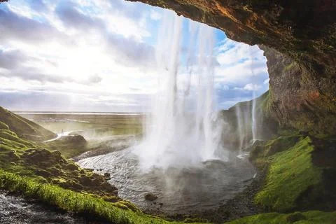 Beautiful waterfall at sunset Stock Photos