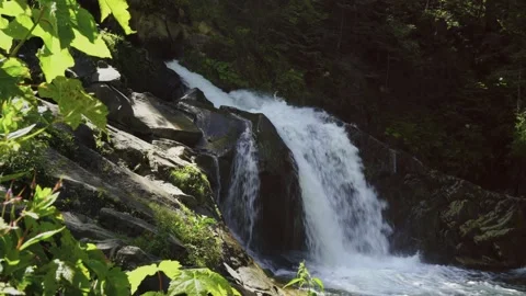 Beautiful Waterfall Surrounded by rocks found in the Carpathian Mountains Video stock 143863531
