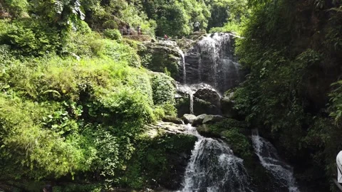 Beautiful Waterfall through the forest Stock Footage 232115806
