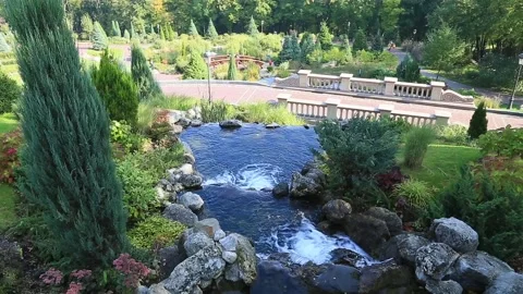 Beautiful waterfall in the villa Stock Footage 86164096