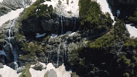 Beautiful waterfalls ander sofia glacier in Caucasian ridge 4k Stock Footage 102209495