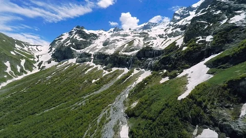 Beautiful waterfalls ander sofia glacier in Caucasian ridge Stock Footage 102211514
