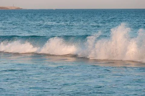 Beautiful wave crushing, breaking with splashes. Summer surf nature backgroun Stock Photos