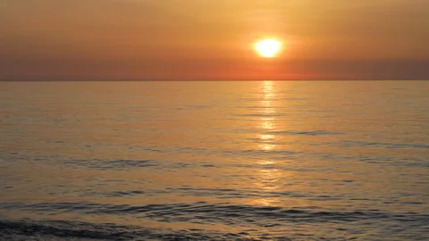 Beautiful wave in orange sunset on the sea Stock Footage 291979080