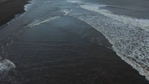 Beautiful waves on the beach at sunset Stock Footage 233943964