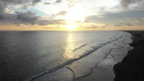Beautiful waves on the beach at sunset Stock Footage 234247889