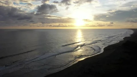 Beautiful waves on the beach at sunset Stock Footage 234247891