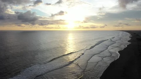 Beautiful waves on the beach at sunset Stock Footage 234248383