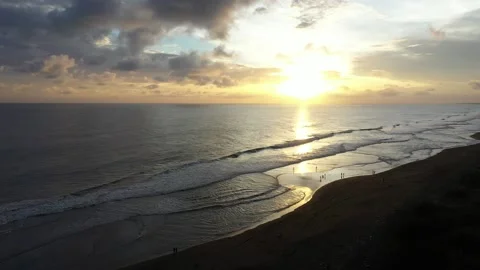 Beautiful waves on the beach at sunset Stock Footage 234248392