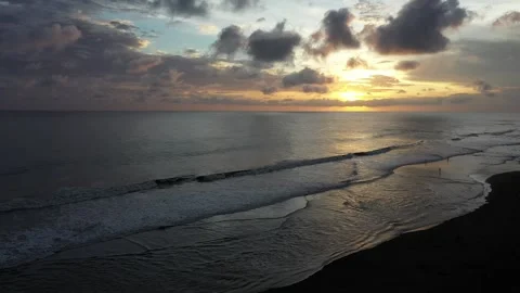 Beautiful waves on the beach at sunset Stock Footage 234248471