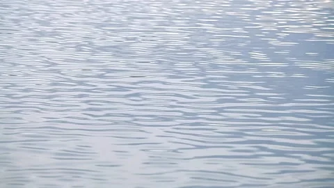 Beautiful waves on the blue surface of the water. Concept lake, river, ocean Stock Footage 148198583
