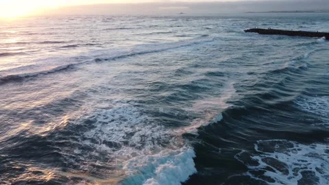 Beautiful Waves during Sunset at Costa da Caparica beach, Portugal Stock Footage 145440227