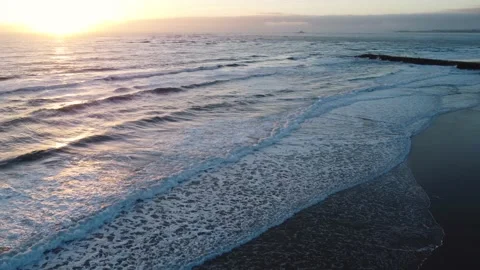 Beautiful Waves during Sunset at Costa da Caparica beach, Portugal Stock Footage 145440230