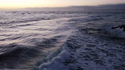 Beautiful Waves during Sunset at Costa da Caparica beach, Portugal Stock Footage 145560867