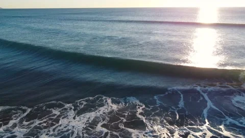 Beautiful Waves during Sunset at Costa da Caparica beach, Portugal Stock Footage 145974938