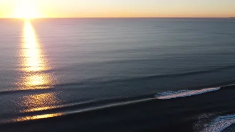 Beautiful Waves during Sunset at Costa da Caparica beach, Portugal Stock Footage 145975261