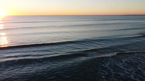 Beautiful Waves during Sunset at Costa da Caparica beach, Portugal Stock Footage 145975324