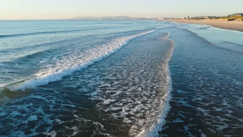 Beautiful Waves during Sunset at Costa da Caparica beach, Portugal Stock Footage 146101788