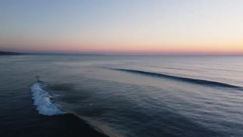 Beautiful Waves during Sunset at Costa da Caparica beach, Portugal Stock Footage 146102483