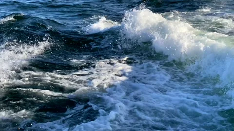 Beautiful waves with foam close-up. The raging blue ocean Video stock 141455863