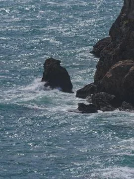 Beautiful waves on the rocks Stock Photos