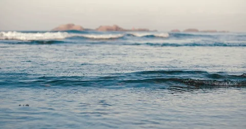 Beautiful waves roll to the shore Stock Footage 87262040