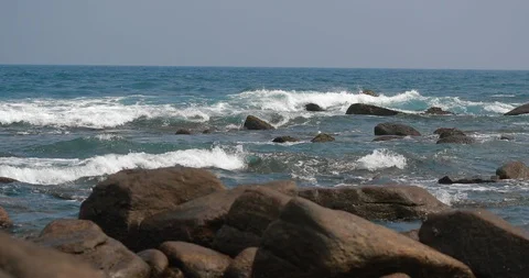 Beautiful waves roll to the shore Stock Footage 87323419