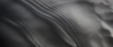 Beautiful waves run over the dark texture of the underlying water in slow motion Stock Footage 106003036