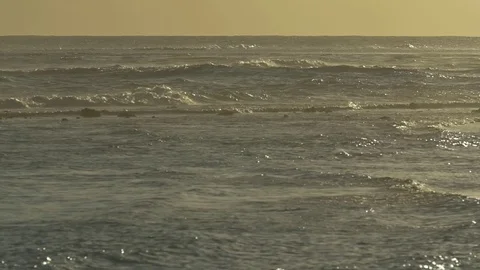 Beautiful waves on seascape during sunset Stock Footage 77803405
