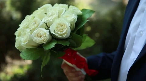 Beautiful wedding bouquet in hands Stock Footage 56550204