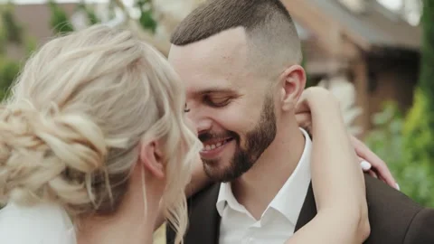 A beautiful wedding day is captured as a bride and groom share tender moments Stock Footage 322051687