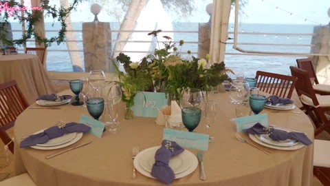Beautiful wedding table serving with blue glasses. Stock-Footage 149778884