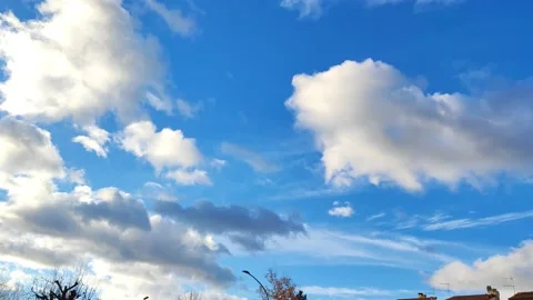 Beautiful white and gray clouds in a blue sky. Stock Footage 232483433