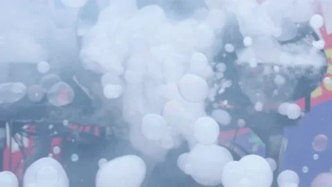 Beautiful white bubbles in party Stock Footage 143705757