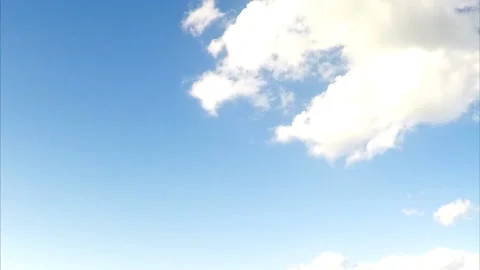 Beautiful white cloud fly through the blue sky timelapse Stockbeeldmateriaal 87211548