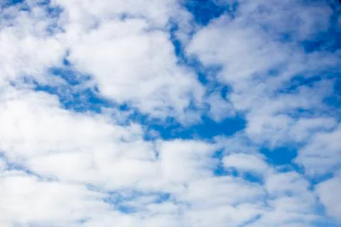 Beautiful white clouds against blue sky. Peaceful background and texture. With Stock Photos