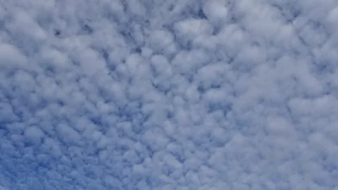 Beautiful white dense cumulus clouds on blue sky. Stock Footage 309623540