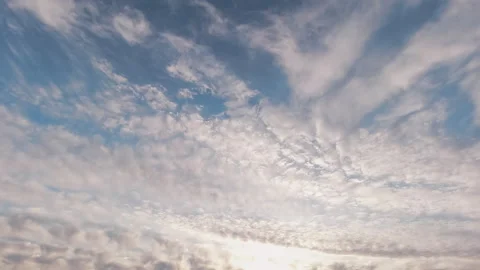 Beautiful White Fluffy Clouds Passing Overhead Blue Sky Timelapse Stock Footage 203358164
