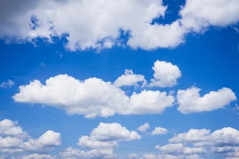 Beautiful white fluffy clouds Stock Photos