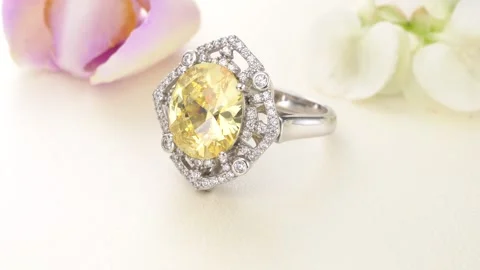 Beautiful White Gold Halo YellowDiamond Ring paved with stones Stock Footage