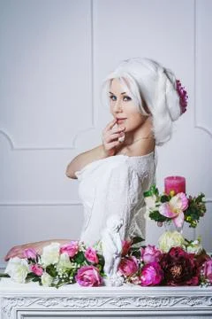 Beautiful white hair woman in fairy white dress Stock Photos