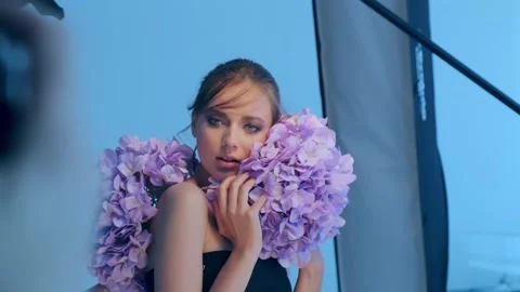 Beautiful White Model Posing for a Photographer.  Behind the scenes of a ph.. Stock Footage 229771950