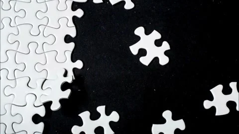 Beautiful White Puzzles on black Surface in Seamless 3d Animation. Abstract Stock-Footage 336248403