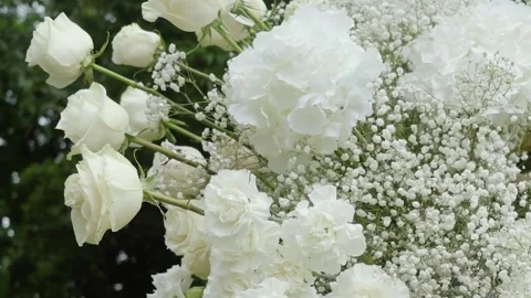 Beautiful white roses and eustoma flowers. Decor and floristry. Stock Footage 321930196