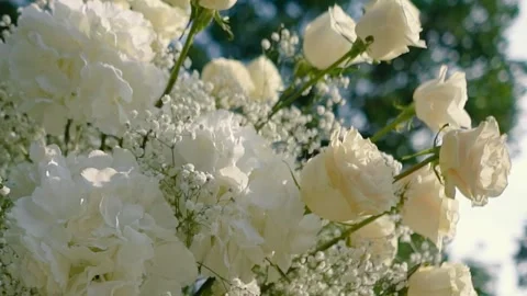 Beautiful white roses and eustoma flowers. Decor and floristry. Stock Footage 321930233