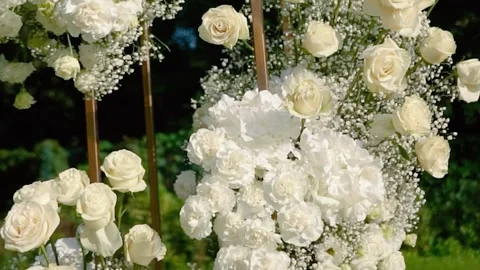 Beautiful white roses and eustoma flowers. Decor and floristry. Stock Footage 321930238