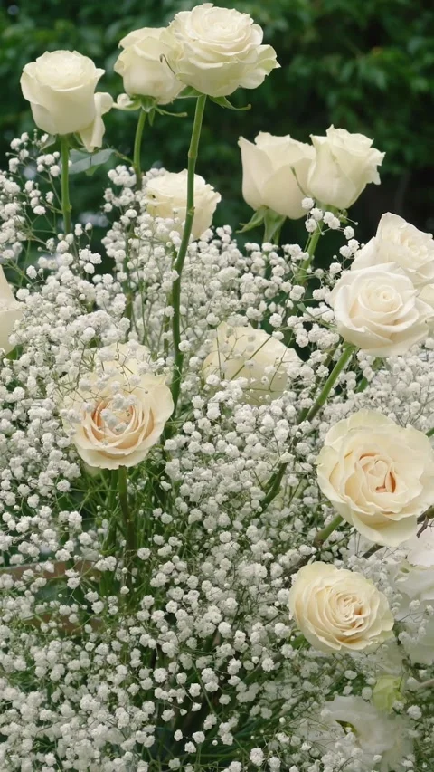 Beautiful white roses and eustoma flowers. Decor and floristry. Stock Footage 321930301